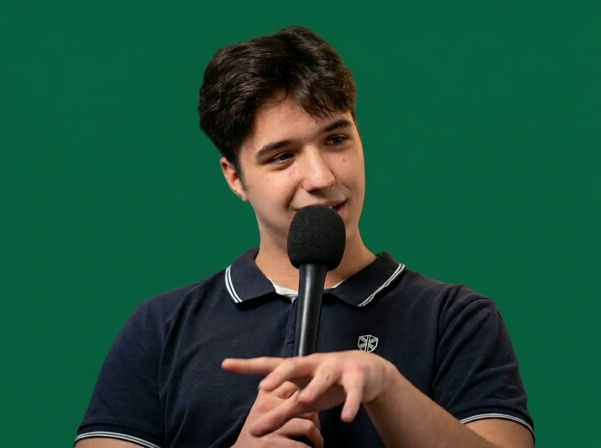 Martin Alexandru holding a microphone