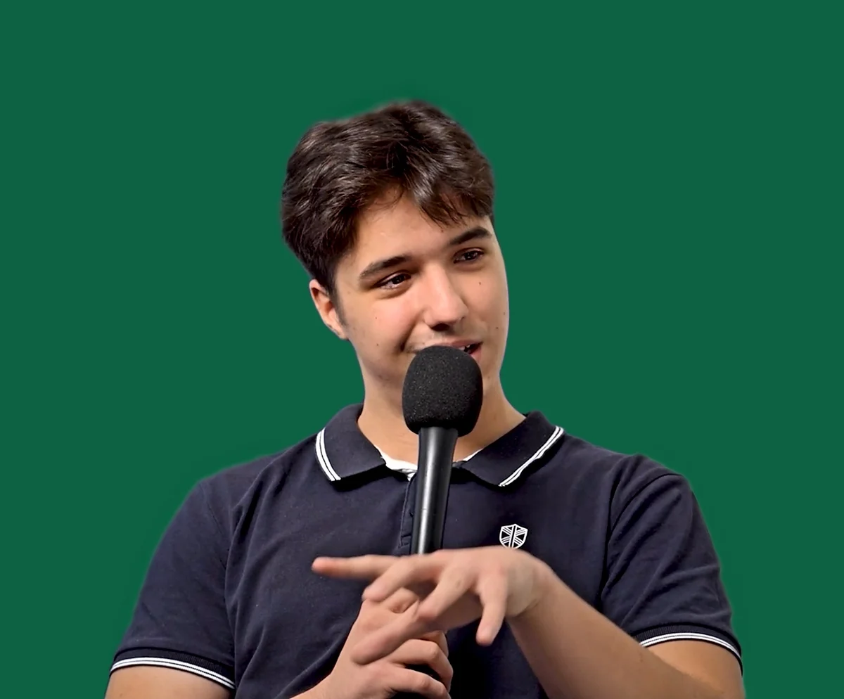 Martin Alexandru holding a microphone